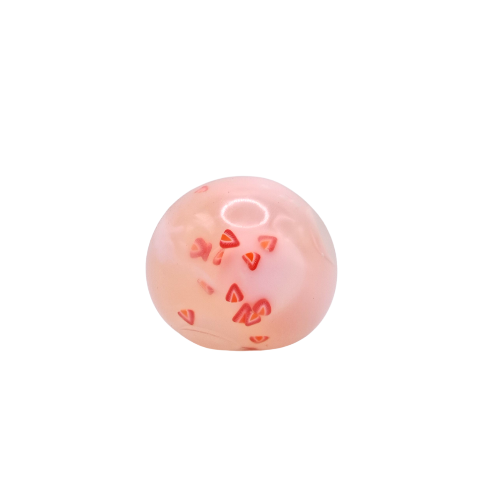 strawberry style triple wax ball squishy with 3 wax balls that can be broken to release a thickening agent to create a unique squish