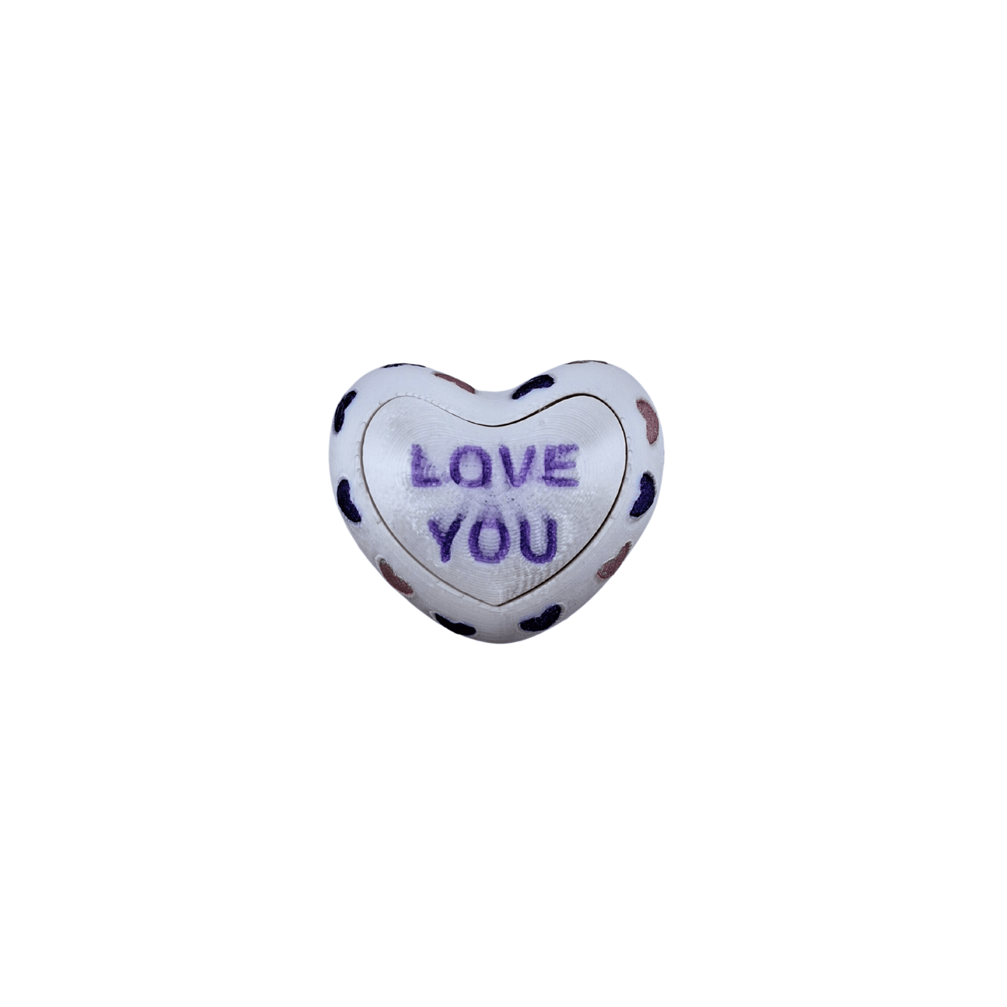 heart shaped clicker fidget toy with pink and purple hearts with "love you" on the front