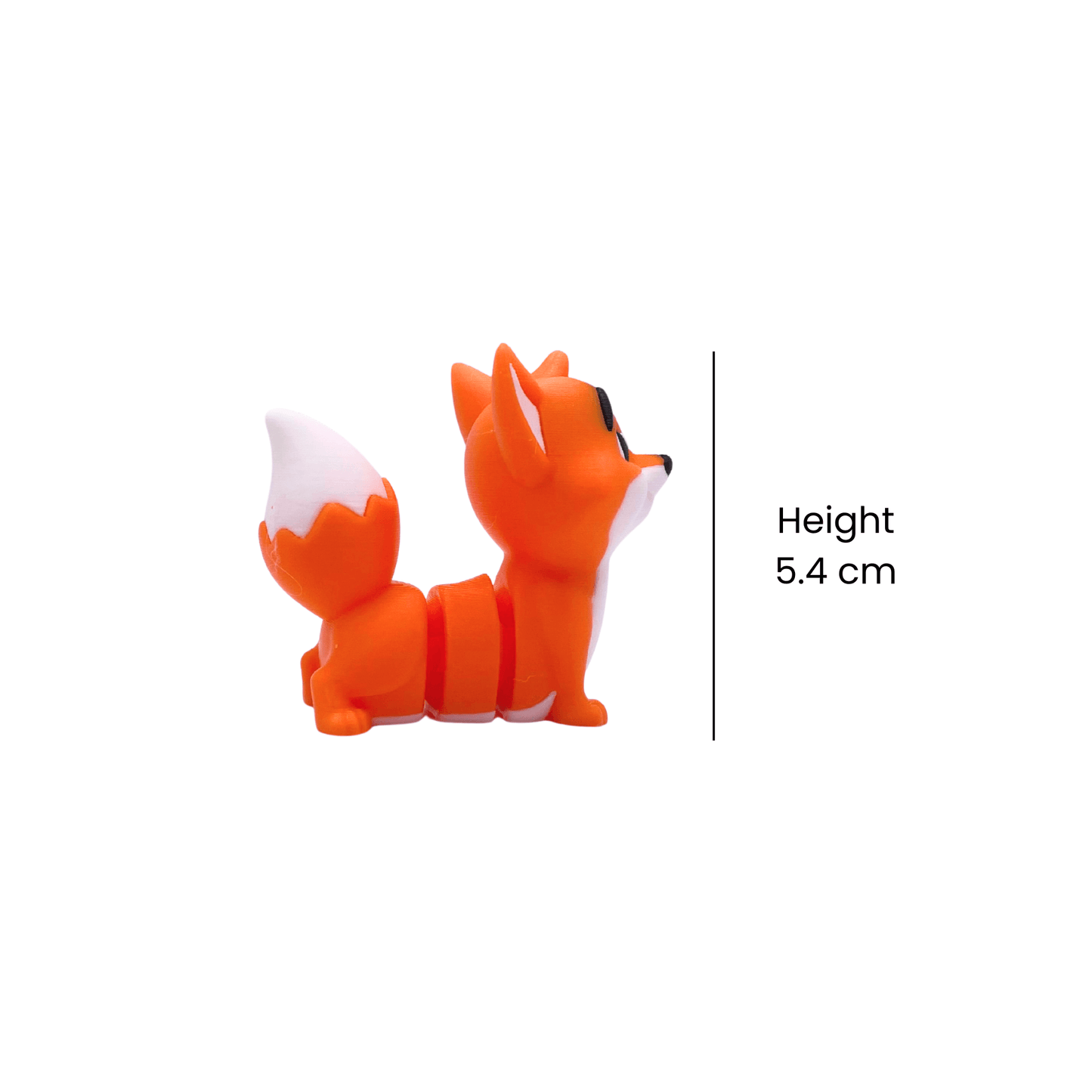 Small orange fox figurine with height measurement on a white background
