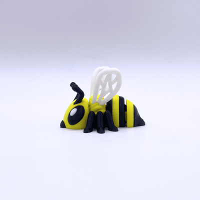 Toy bee figure on a white background