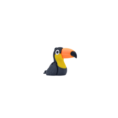 Toy figure of a toucan on a white background