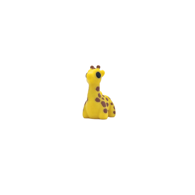 Yellow giraffe figurine on a white background