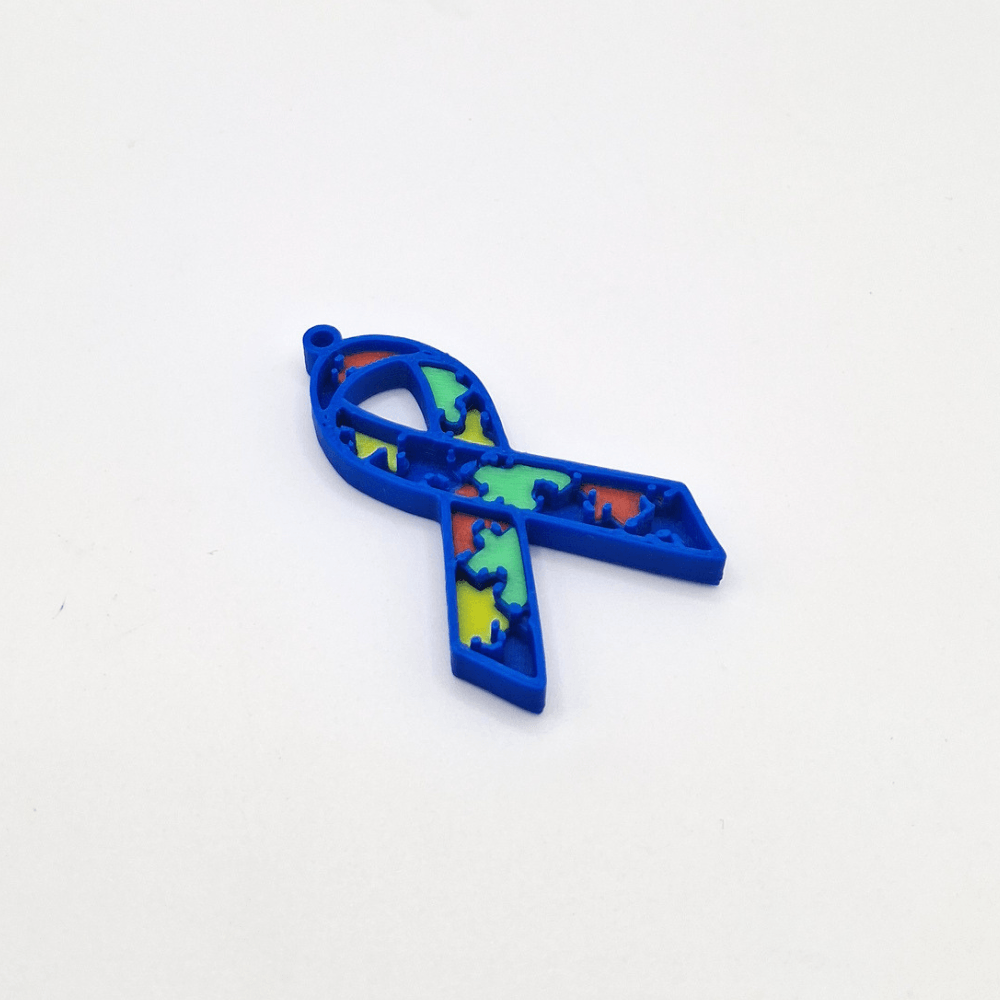 Colorful ribbon with puzzle pieces on a white background