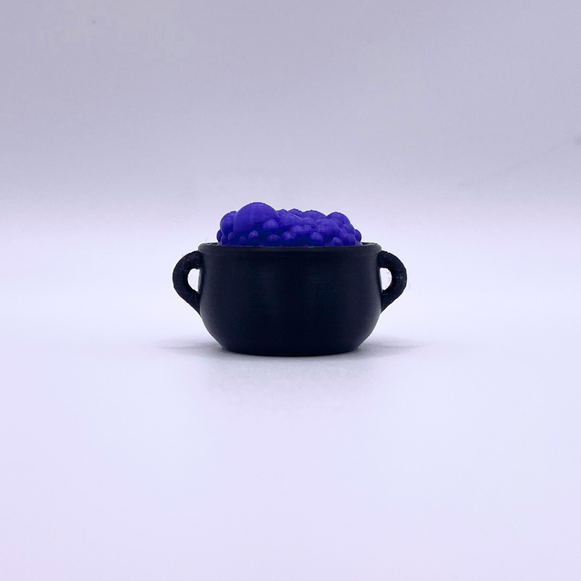 Cauldron Clicker Halloween fidget toy with crisp ASMR clicks, spooky design, and magical style—perfect seasonal gift for stress relief.