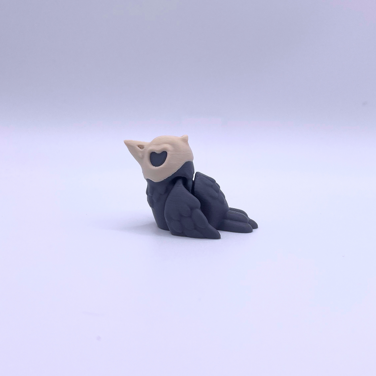 flexi crow fidget toy with skull head