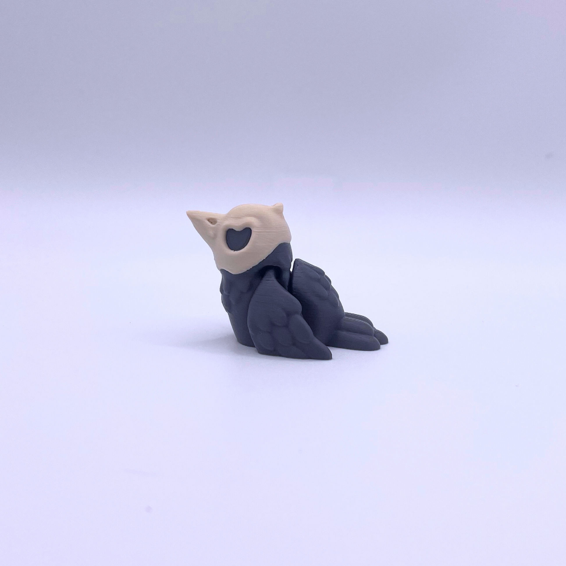 flexi crow fidget toy with skull head
