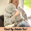 Adult using a weighted stuffed animal for anxiety, highlighting its calming benefits and comfort.