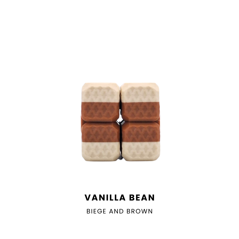Four rectangular vanilla bean-shaped items arranged in a 2x2 grid on a white background, with text below reading 'VANILLA BEAN' and 'BIEGE AND BROWN'. The items have a warm beige patterned top and bottom with a medium brown textured center band.