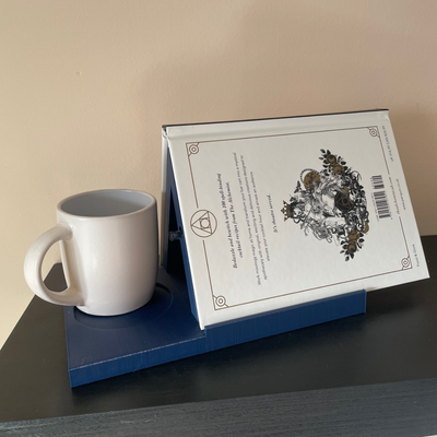 Tabletop book rest with mug holder