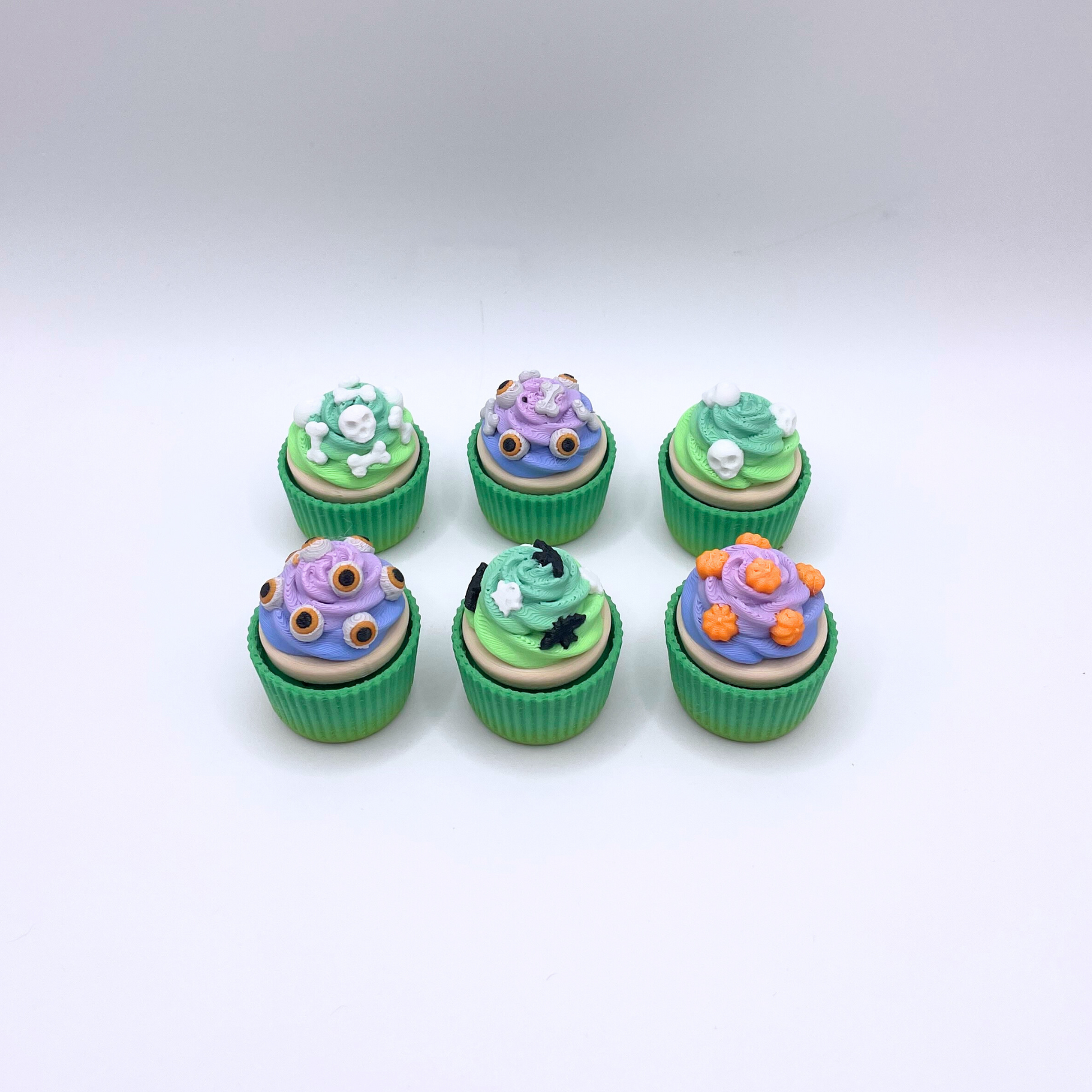 Cupcake Clicker Box fidget toy set with colorful cupcake-themed design, crisp ASMR clicks, and fun stress relief for kids and adults.
