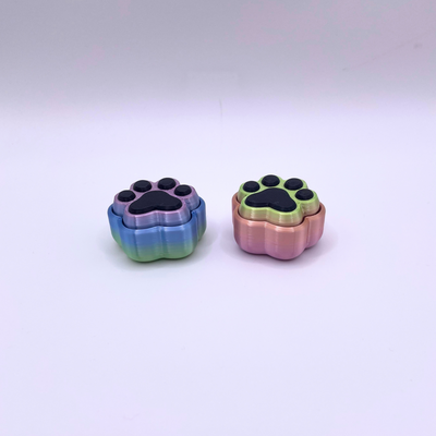 Paw Print Clicker fidget toy in exclusive rainbow design, crisp ASMR clicks for stress relief, focus, and sensory satisfaction.