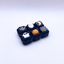 Halloween Clicker Pad with 6 spooky buttons, crisp ASMR clicks, and festive design – limited edition Halloween fidget toy.