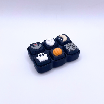 Halloween Clicker Pad with 6 spooky buttons, crisp ASMR clicks, and festive design – limited edition Halloween fidget toy.