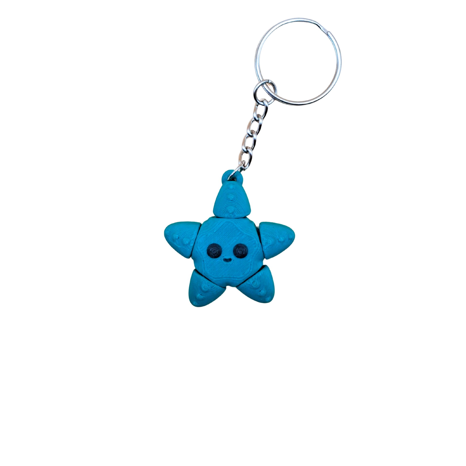 green starfish keychain with a smiley face on a white background
