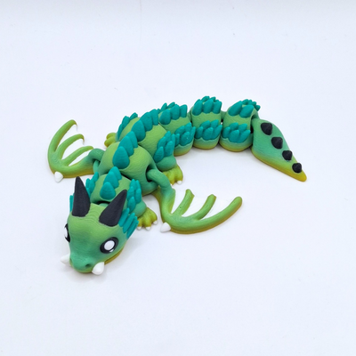 forest dragon flexi fidget toy green and yellow, fine detailing premium quality