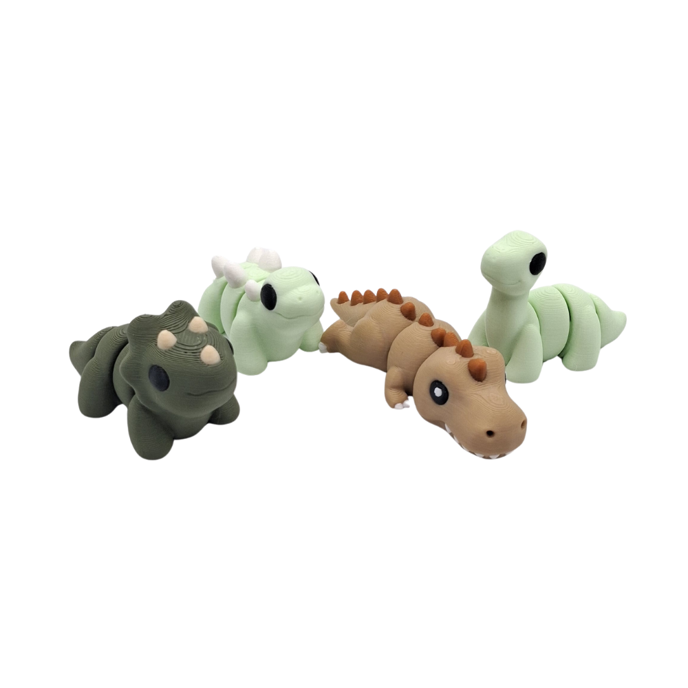 Four dinosaur-shaped toys in different colors on a white background