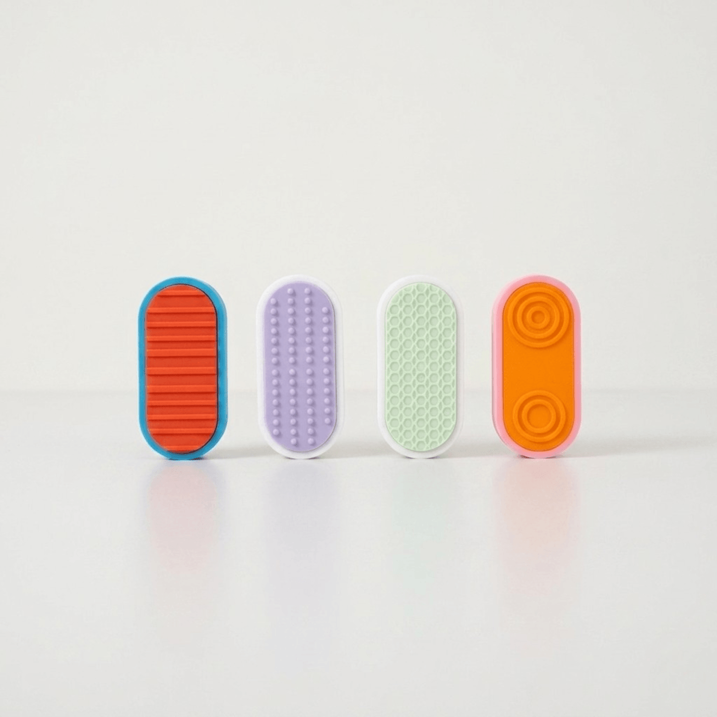 Custom Mag Slider by Holly in various colors and textures, showcasing its unique design and custom options.