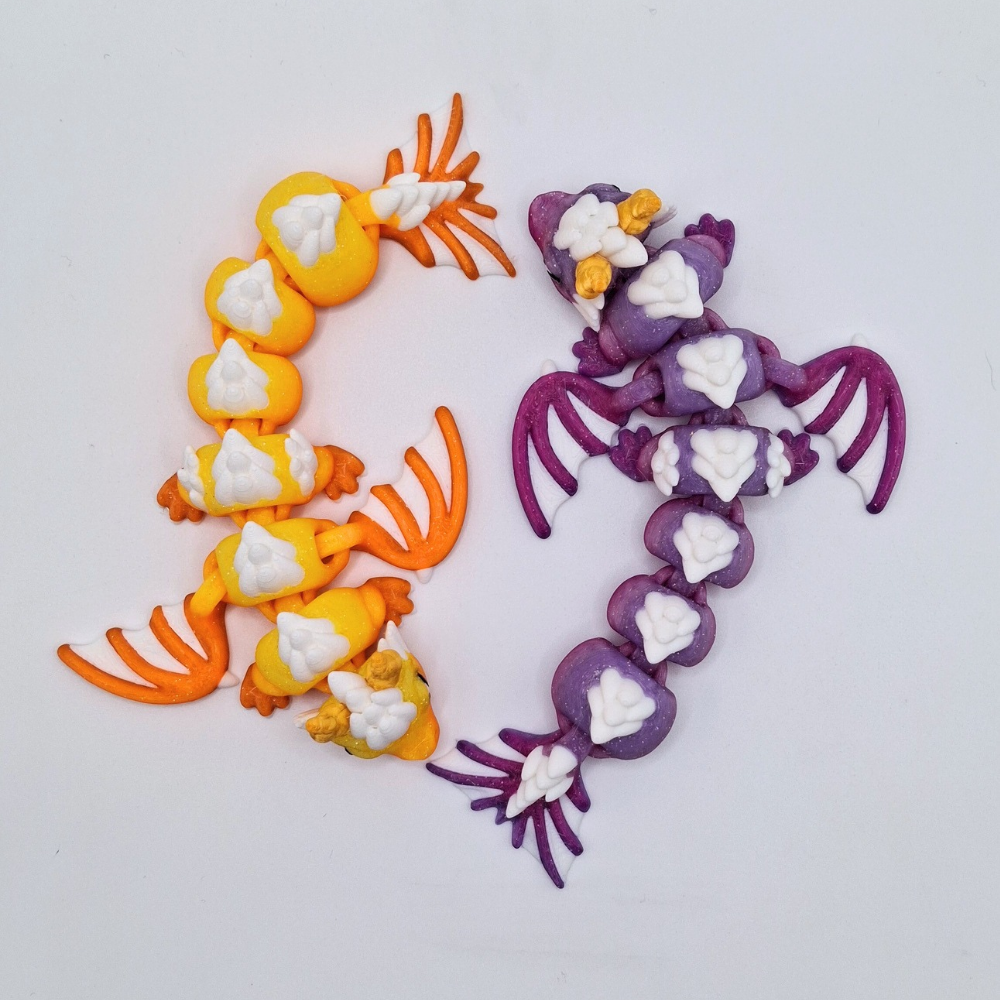 dream dragon flexi fidget toy glitter ink, purple, yellow, orange colourful sensory toy