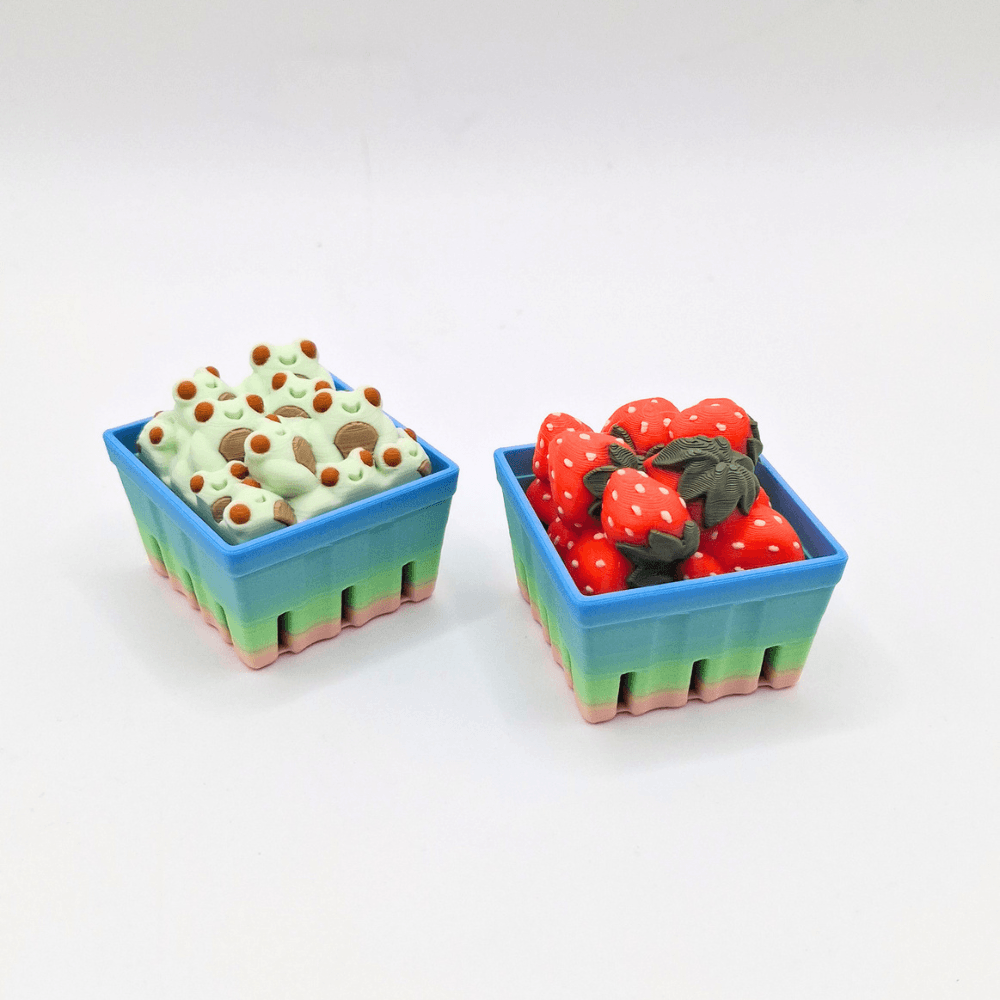 basket of frogs and strawberry clicker sensory fidget toy magic pastel rainbow colour