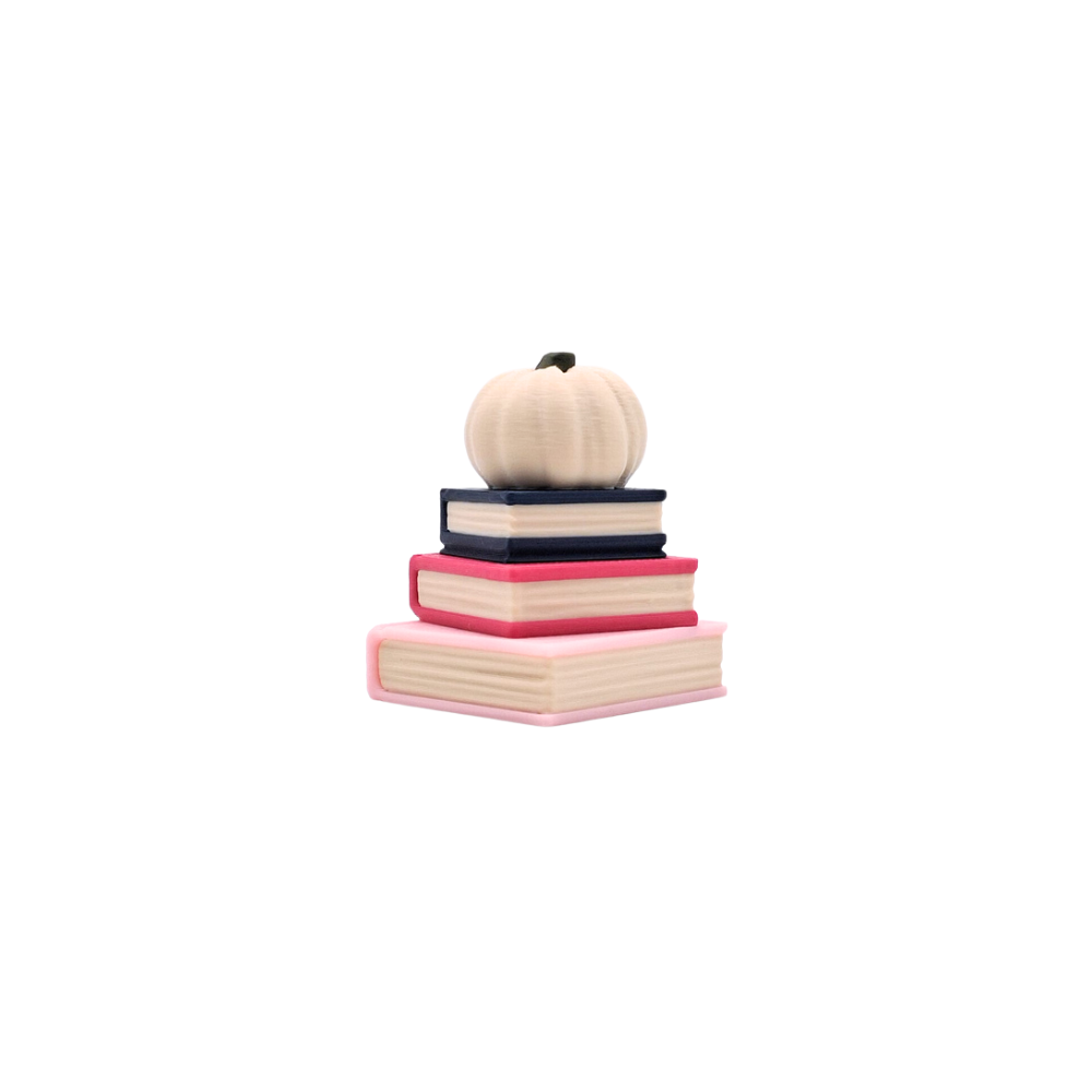 Book stack clicker with beige pumpkin top button sensory fidget toy