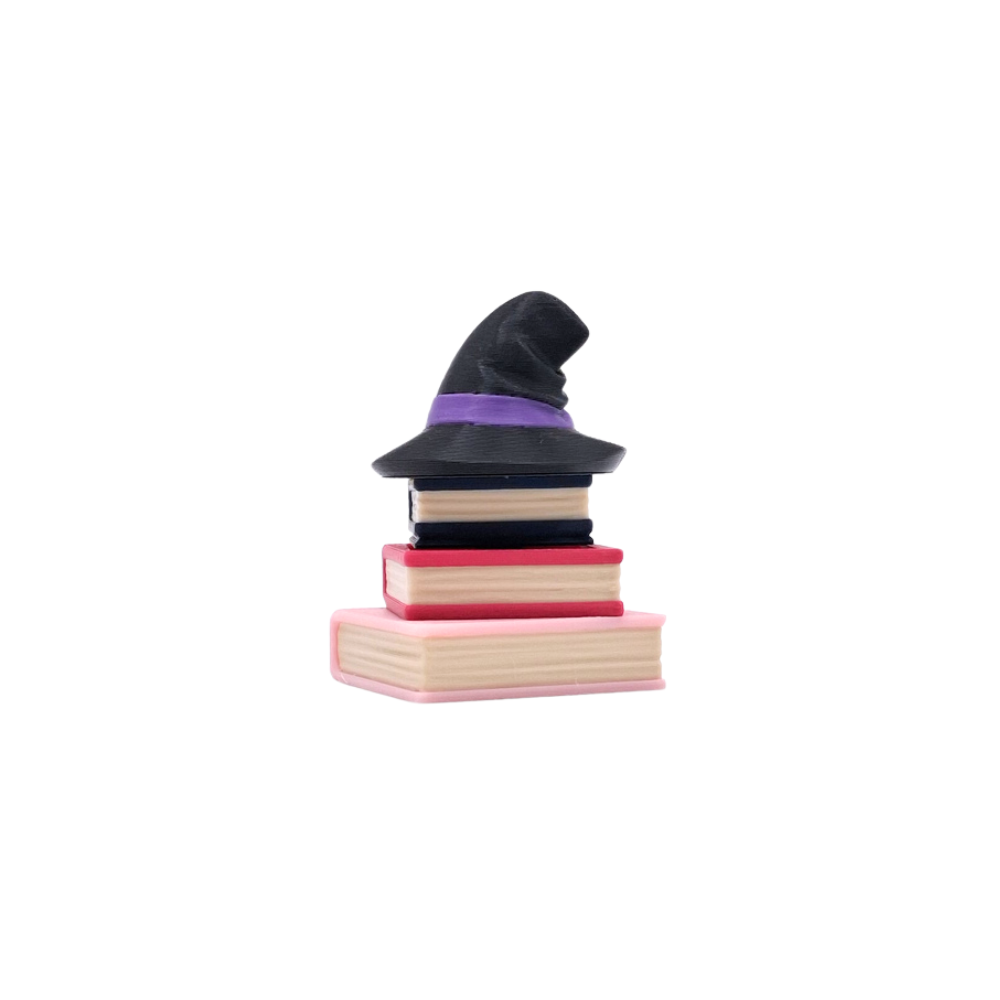 Book stack clicker with witch hat top button sensory fidget toy