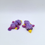 polly parrot figurine key charm purple and pink