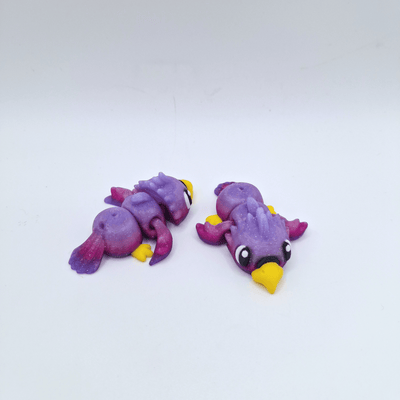 polly parrot figurine key charm purple and pink